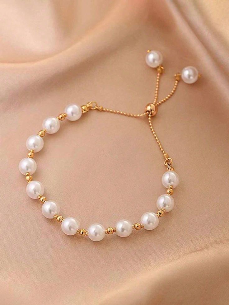 Elegant White Pearl Bracelet with Gold Accent